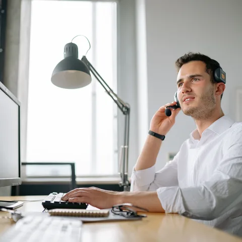 An advisor on a support call assisting with a claim