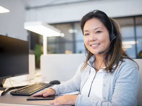 Claims support advisor on a call assisting a customer