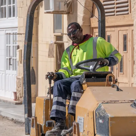 An operator with heavy construction machinery