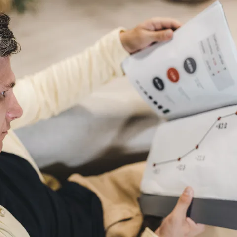 An investor reviewing an investment growth chart