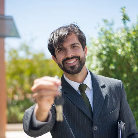 A property owner reviewing a rental building