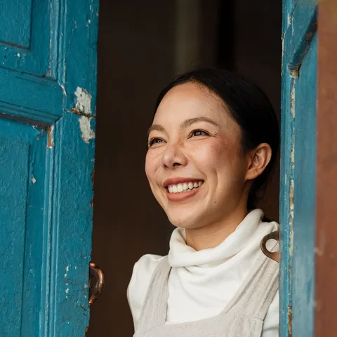 A retail shop owner in their store