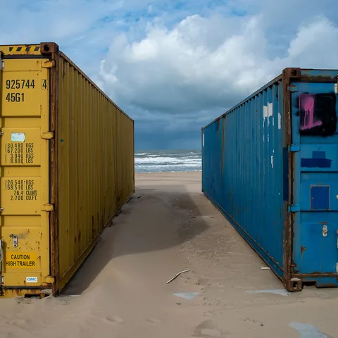 Cargo containers stacked at a shipping port
